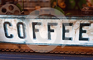 Retro Coffee Sign In A Shop Window