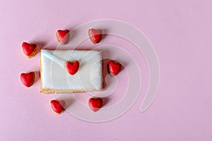 Retro cookies in shape of white envelope and little hearts