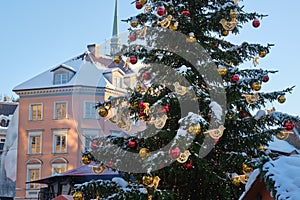 Retro decorated Christmas tree at the Dome Square in old Riga. Riga, Latvia