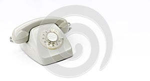 Retro desktop telephone isolated on a white background. Space for text
