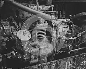 Retro diesel motor of tractor. Black and white photo