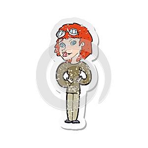 retro distressed sticker of a cartoon aviator woman