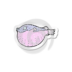 retro distressed sticker of a cartoon blowfish