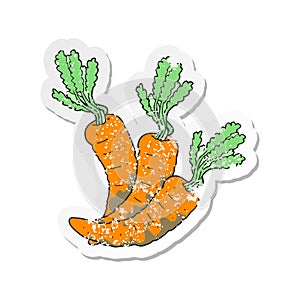 retro distressed sticker of a cartoon carrots photo