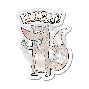 retro distressed sticker of a cartoon hungry wolf