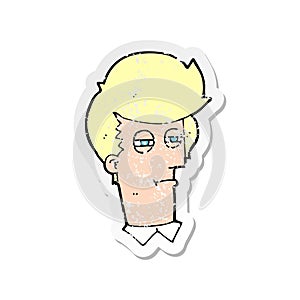 retro distressed sticker of a cartoon man with narrowed eyes