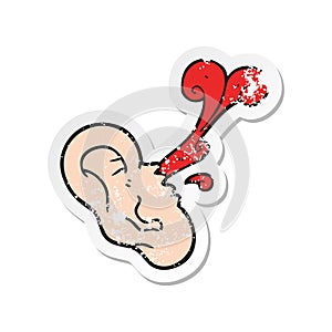 retro distressed sticker of a cartoon severed ear
