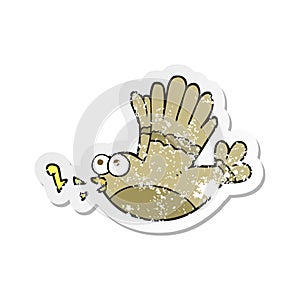 Retro distressed sticker of a cartoon singing bird