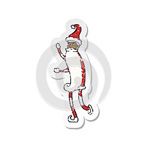 retro distressed sticker of a cartoon skinny santa