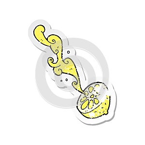 retro distressed sticker of a cartoon squirting lemon