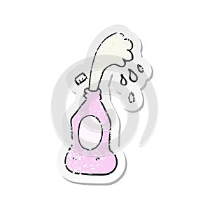 retro distressed sticker of a cartoon squirting lotion bottle