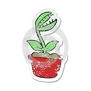 retro distressed sticker of a cartoon venus fly trap