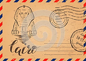 Retro envelope with stamps, Cairo label with hand drawn Sphinx, lettering Cairo