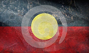 retro flag of Indigenous Australian peoples Aboriginal Australians with grunge texture. flag representing ethnic group or culture photo