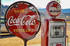 Retro gas pump and rusty coca-cola sign on route 66