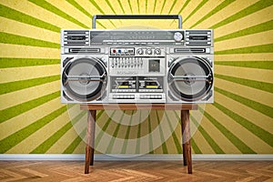 Retro ghetto blaster boombox, radio and audio tape recorder on vintage background