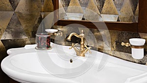 Retro golden classic bathroom interior, clean bright stylish designer modern bathroom