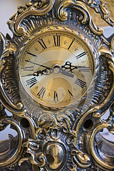 Retro goldish clock for cabinet photo