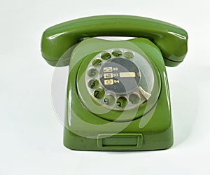 Retro green dial phone with emergency numbers