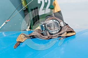 Retro hat and goggles on blue wings