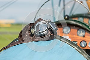 Retro hat and goggles on blue wings