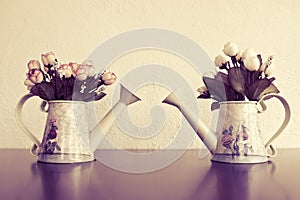 Retro home decor, flowers and on a wall shelf