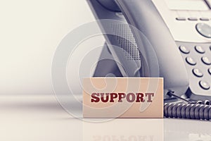 Retro image of business telephone support concept