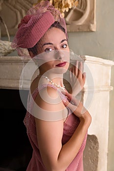 Retro lady in antique interior