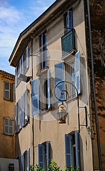 Retro lantern on wall of old building, Antibes, France photo