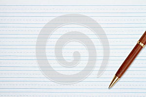 Retro lined school paper with a pen background