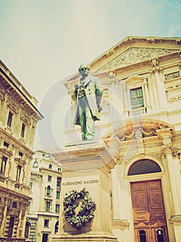 Retro look Manzoni statue, Milan