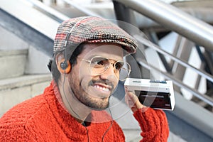 Retro looking guy listening to music