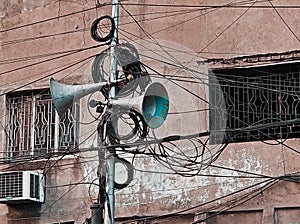 Retro loud speakers jumbled with wires photo