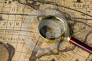 Retro magnifier with old map