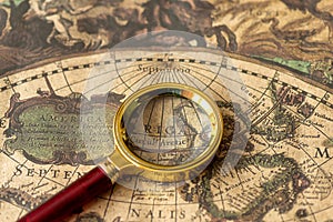 Retro magnifier with old map