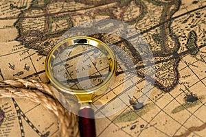 Retro magnifier with old map