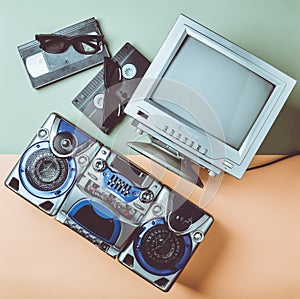 Retro media technologies. Entertainment 80s. Black white lamp TV, tape recorder, video cassette, 3d glasses