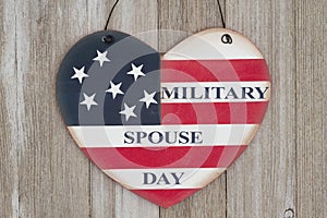 Retro Military Spouse Day heart sign on weathered wood