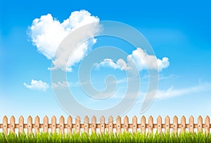 Retro nature background with blue sky with hearts shape clouds.