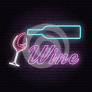 Retro neon wine sign on brick wall background.