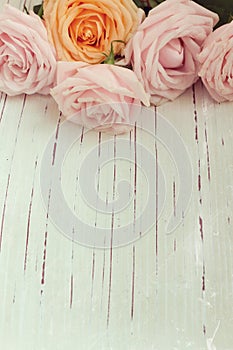 Retro nostalgic background with roses for Mother's Day celebration photo