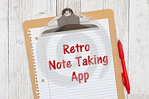 Retro Note Taking App humorous message on lined paper with a pen on a clipboard