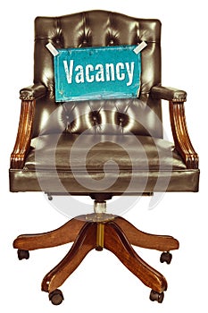 Retro office chair with vacancy sign isolated on white