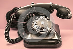 Retro, old black dial vinyl phone