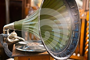 Retro old gramophone radio. Vintage aged turquoise gramophone phonograph turntable