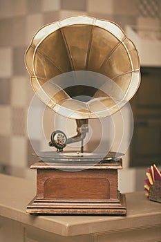 Retro old gramophone radio. Vintage style toned photo