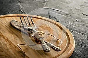Retro old kitchen tools on wooden board