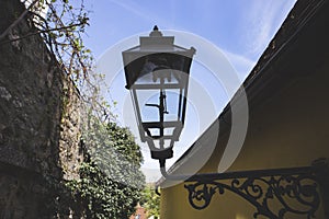 Retro, old, steel lantern filled with gas at night to light, as it was lit for decades in the Zagreb Upper town,