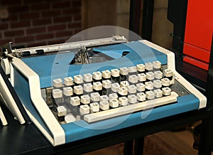 Retro old vintage typewriter on wood desk