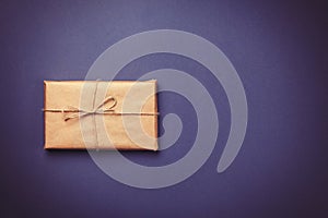 Retro package on purple background.